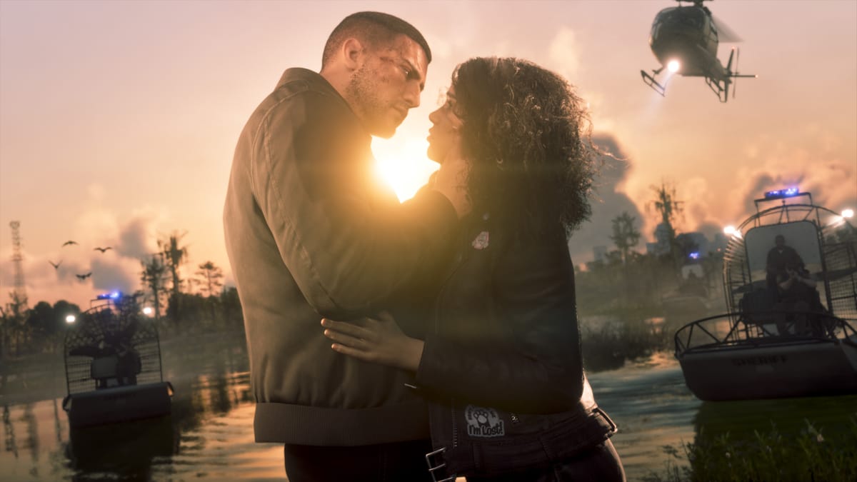Captura de GTA VI: Jason y Lucia abrazados en un embarcadero al atardecer con un helicóptero sobrevolando
